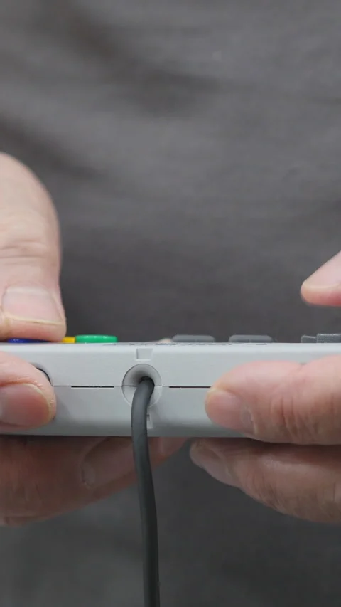 Close View Of Game Controller Being Held By Person. Vertical. Stock Footage 318727116