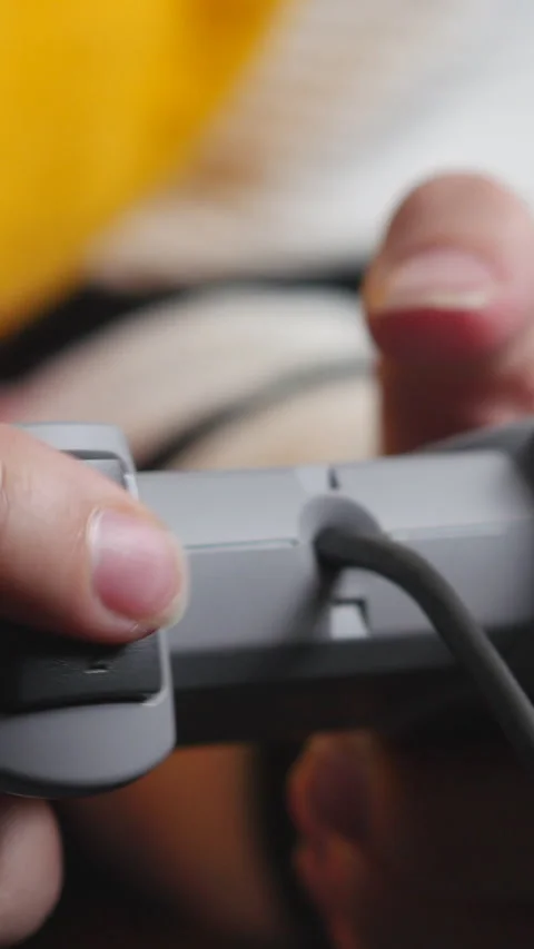 Close View Of Game Controller With Wired Cable. Vertical. Stock Footage 302540098