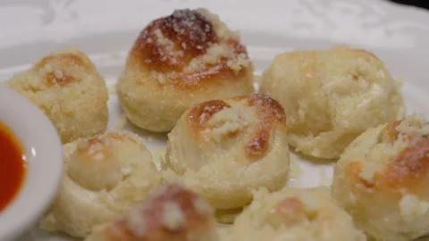 Close view of garlic knots and cheese Video stock 346504174