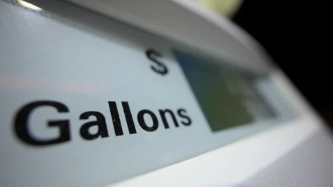Close up view of Gas station pump display showing fuel price and gallons during Stock Footage 334056842