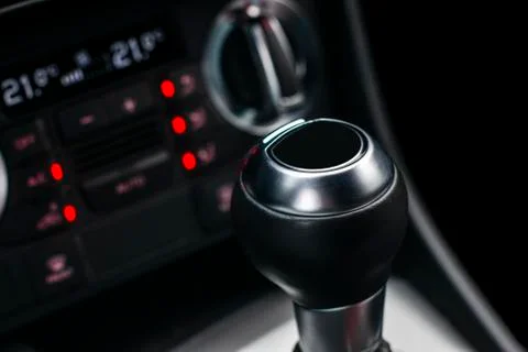 Close up view of a gear lever shift. Manual gearbox. Car interior details. Stock Photos