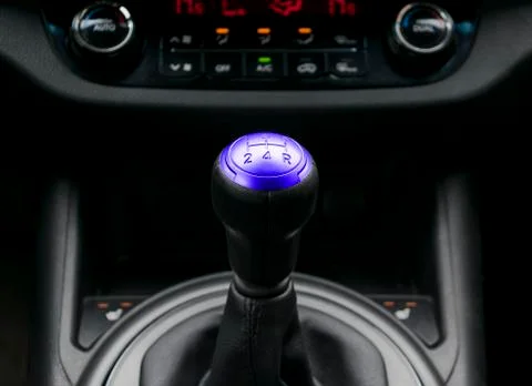 Close up view of a gear lever shift. Manual gearbox. Car interior details. Stock Photos