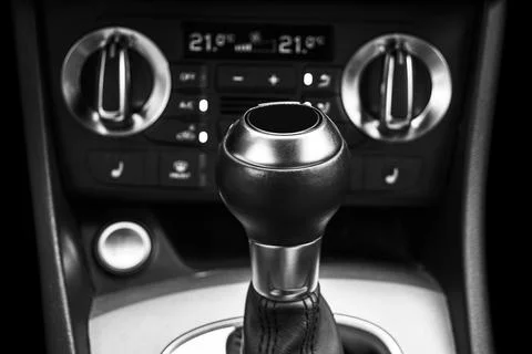 Close up view of a gear lever shift. Manual gearbox. Car interior details. .. Stock Photos