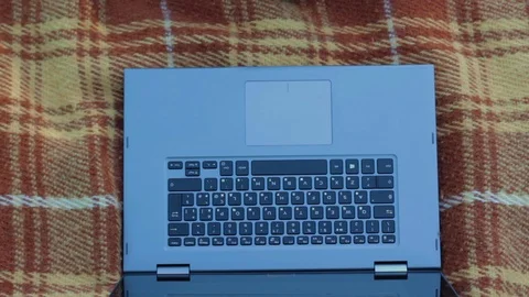Close up view of a girl's hands. Working on the laptop. View from above Stock Footage 75857021