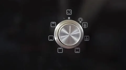 Close up view. Glass front panel of modern electric oven with shiny button Stock Footage 91666337