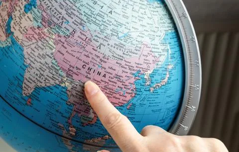 Close-up view of Globe pointing at China Foto stock