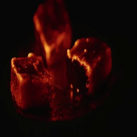 Close view at a glowing charcoal and flame. Shallow depth of field 스톡 동영상 69460635