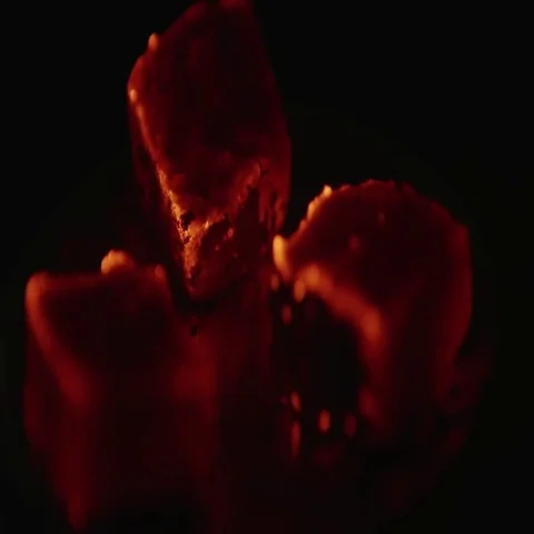 Close view at a glowing charcoal and flame. Shallow depth of field Vídeos de archivo 69483148