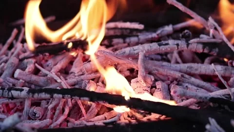 Close up view of glowing flying fire flame from hot bonfire charcoal. Stock Footage 130182253