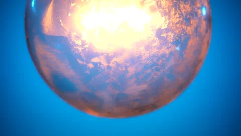 Close up View of Glowing Light Bulb on Blue Background 스톡 동영상 329767592