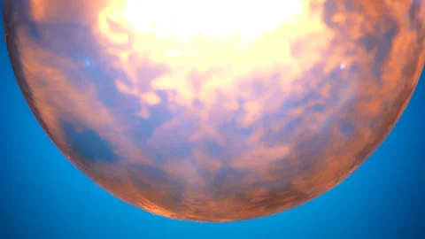 Close up View of Glowing Light Bulb on Blue Background Vídeo Stock 329767669