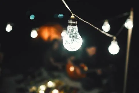 Close up view of the glowing light bulbs Stock Photos
