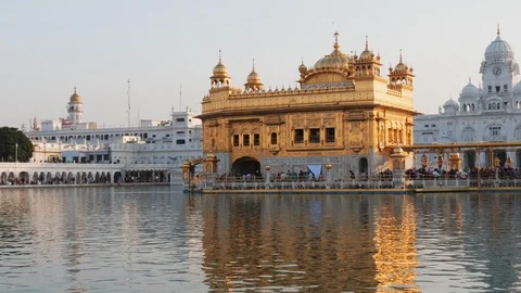Close view of the golden temple and the surrounding pool in amritsar Stock Footage 113324604