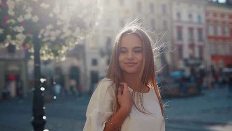 Close up view of good looking stylish blonde Caucasian woman blowing a kiss Stock Footage 112673633