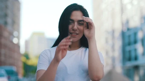 Close up view of gorgeous attractive young woman playfully shaking her hair Stock Footage 111219138