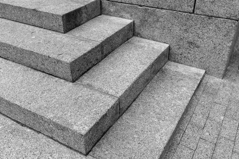 Close-up view of granite steps in black-and-white highlighting sharp geomet.. Stock Photos