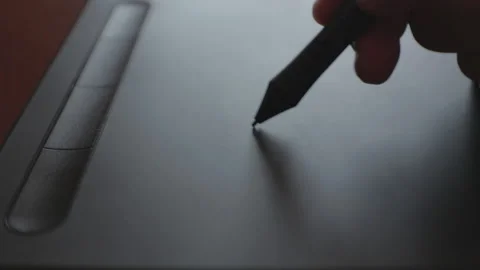 Close up view of graphic designer Drawing with the stylus on a graphics table Video stock 140019784