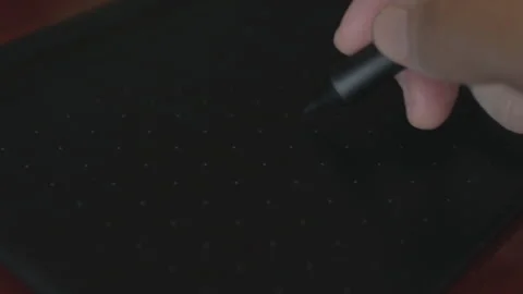 Close up view of graphic designer Drawing with the stylus on a graphics table Video stock 140019894