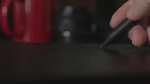 Close up view of graphic designer Drawing with the stylus on a graphics table Video stock 140020109