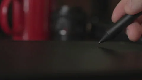 Close up view of graphic designer Drawing with the stylus on a graphics table Video stock 140020297