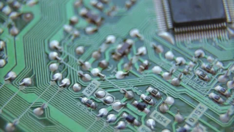 Close up view of green electronic circuit board components Stock Footage 333836998