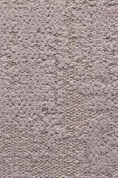 Close-up view of grey textured carpet surface with a looped pile pattern Stock Photos