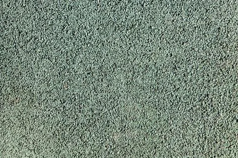 Close-up view of grey textured surface with rough grainy finish 写真素材