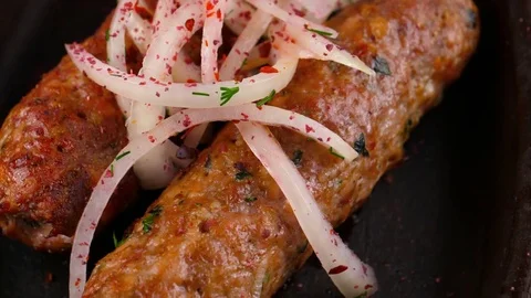 Close-up view of Grilled lula kebab, traditional oriental dish barbecue Stock Footage 83161851