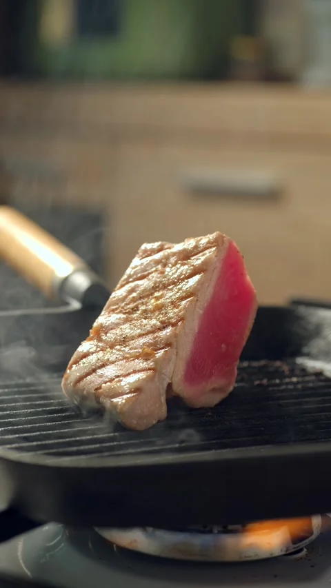 Close-up view of grilling tuna steak Stock Footage 342388819