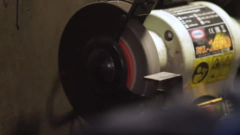 Close view grinding machine tool works at factory room Stockbeeldmateriaal 101044331