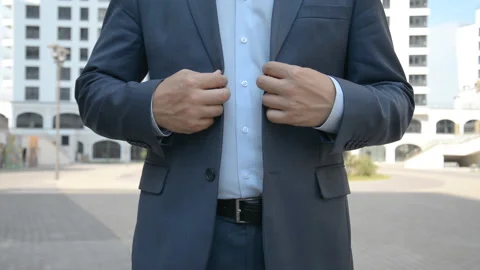 The Close-Up View Of The Groom Buttoning The Jacket Stock Footage 109667842