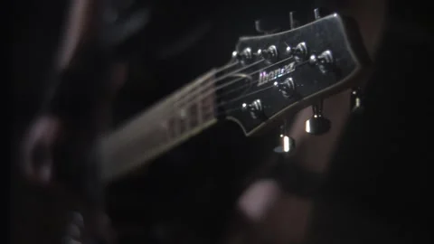 Close-up view of guitar strings and tuning pegs Stock Footage 300114397