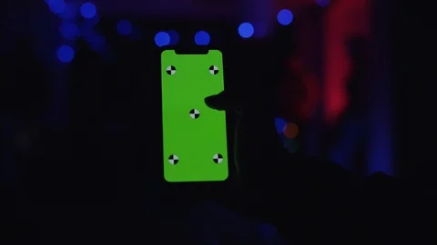 Close up view of a hand actively scrolling, tapping the green chroma key screen Stock Footage 111221222