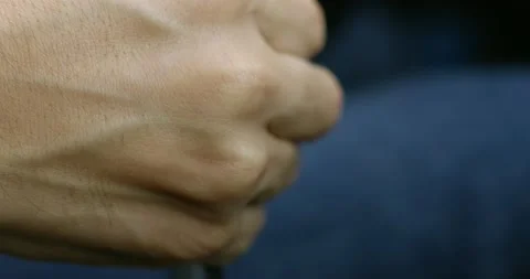 Close up view of a hand of a man moving the gear lever of a car - RED Camera 4K Stock Footage 150210691