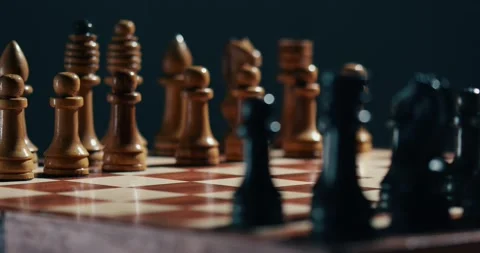 Close up view of the hand of a man playing chess Stock Footage 131084701
