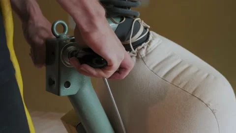 Close up view of hand Man sanding a wood parquet with a parquet sanding machine Stock Footage 163505259