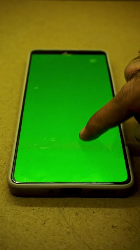 A close up view of a hand scrolling on a smartphone device featuring a vibr.. Stock Footage 345138877