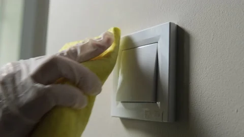 Close up view of hand wipes the surface with an anti-bacterial agent Stock Footage 130687933
