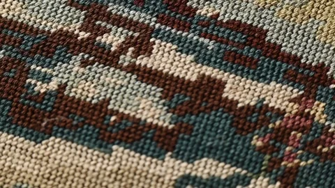Close-up view of a hand-woven tapestry, colorful textile elements. Tapestry weav Stockbeeldmateriaal 284431188