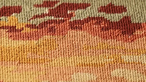 Close-up view of a hand-woven tapestry, colorful textile elements. Tapestry weav Stockbeeldmateriaal 284431434