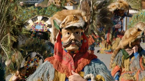 Close-up view of a handmade carnival mask made of wood from Tyrol Stock Footage 103660785