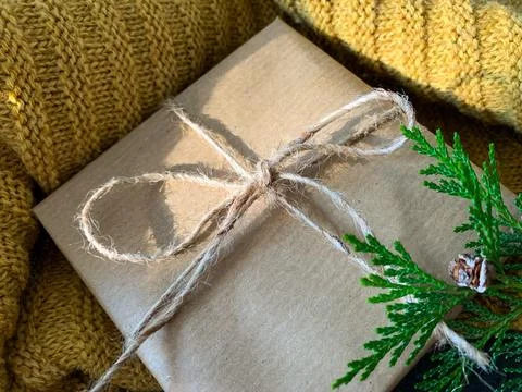 Close up view handmade gift box. Christmas holiday cozy, mood concept. Stock Photos