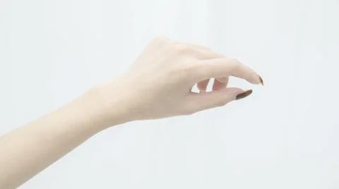 Close-up view of hands applying cream Stock Photos