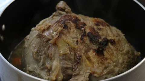Close-up view of the hands of the chef preparing braised beef in the pot Stock Footage 122160918