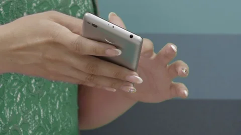 Close Up View On Hands Of Employees Watching Video On Smartphone Indoors Stock Footage 92783532