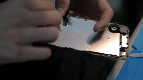 Close view hands fix protective stratum reflecting light Stock Footage 104656191