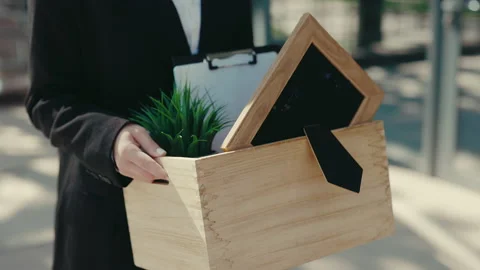Close Up View of the Hands Holding the Box with Containing Work Items. Business Stock Footage 233971880