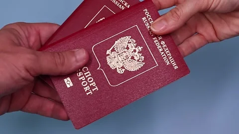 Close up view of hands holding russian passport. Stock Footage 289753291