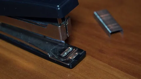 Close-up View of Hands insert Staples in the Stapler. 4K Stock Footage 46000849