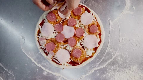 Close up view hands of a man chef cooking italian pizza. The process of making 스톡 동영상 152724014